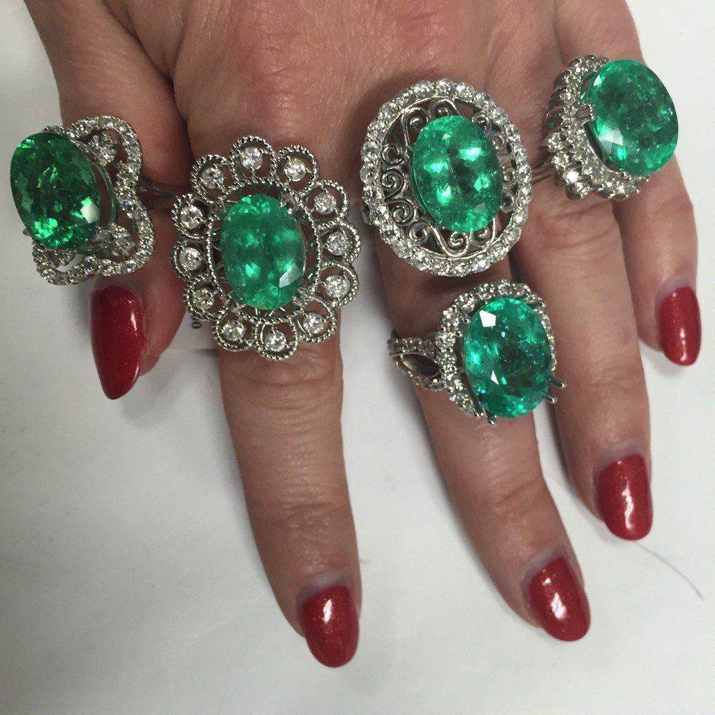 Paraiba Tourmalines elegantly stacked on her hand